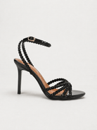 Mescini black rhinestone strappy stiletto sandals, a single shoe side on in the studio, US women's sizes