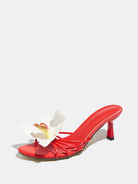 Mescini red orchid bloom strappy heeled mules, single shoe seen from the front, US women's sizes
