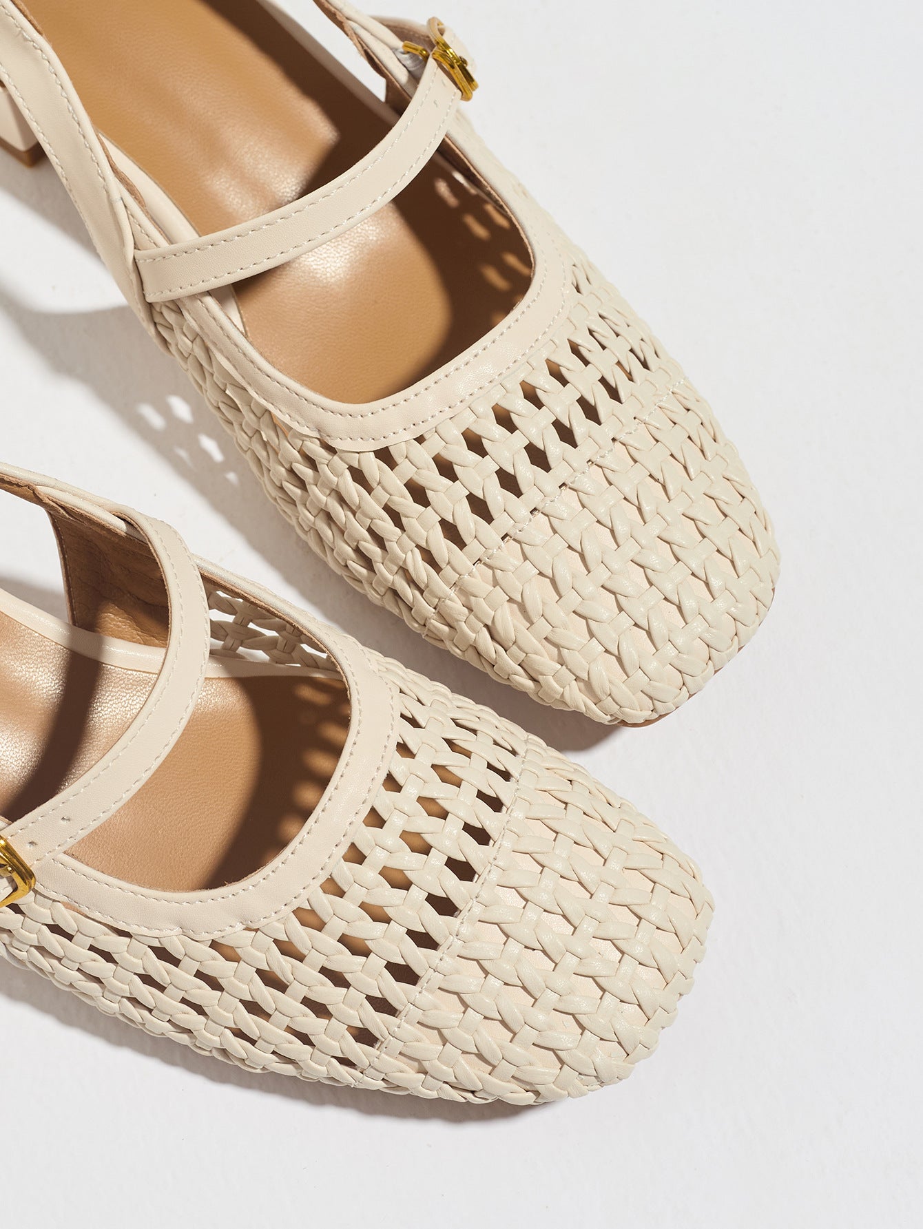 Mescini white woven square toe mary jane heels, close crop of the buckle straps, US women's sizes