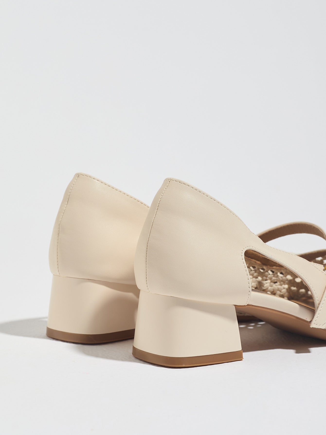 Mescini white woven square toe mary jane heels, back view of the two shoes, US women's sizes