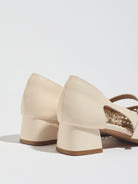 Mescini white woven square toe mary jane heels, back view of the two shoes, US women's sizes