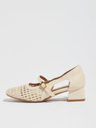 Mescini white woven square toe mary jane heels, single shoe in full side view, US women's sizes