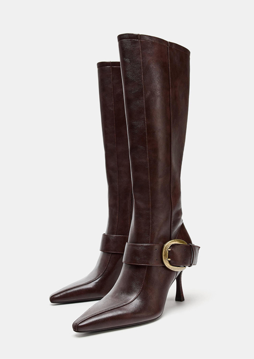 Mescini brown buckled pointed toe knee high boots, pair standing in the studio, US women's sizes