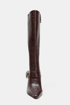 Mescini brown buckled pointed toe knee high boots, front view of a single shaft, US women's sizes