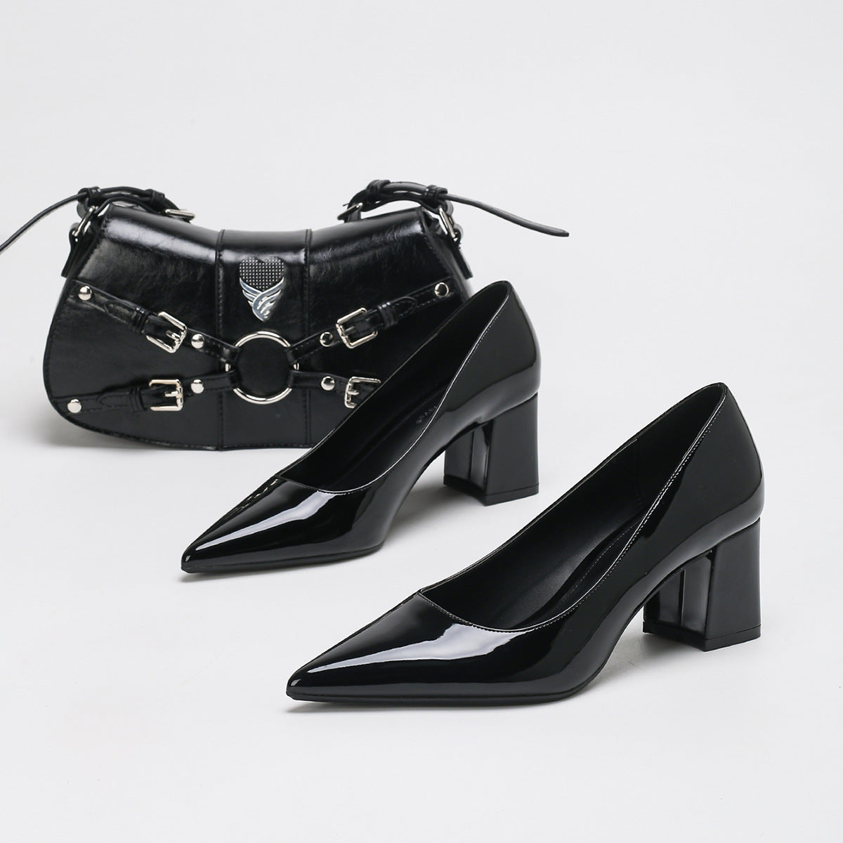 Mescini - black pointed toe block heel pumps with a shoulder bag, angled pair, US women's sizes