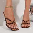 Mescini leopard print square toe strappy heeled mules worn on the model, US women's sizes