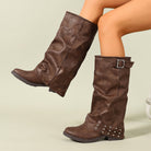 Mescini dark brown fold over slouch boots showing the wide loose shaft, US women's sizes