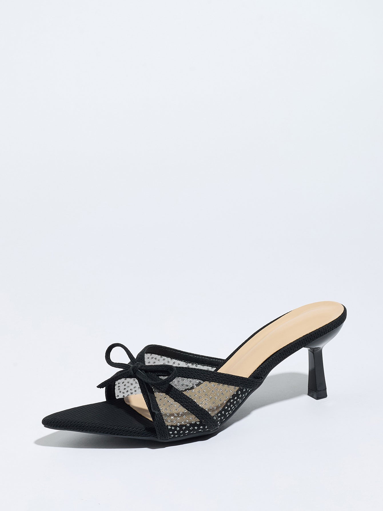 Mescini black bow mesh pointed toe mule heels, single shoe angled on a pale ground, US women's sizes
