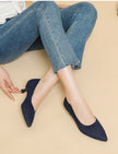 Mescini navy knit pointed toe kitten heel pumps, worn seated with cropped jeans, US women's sizes