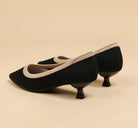 Mescini black knit pointed toe kitten heel pumps, angled studio view of the pair, US women's sizes