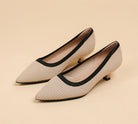 Mescini beige knit pointed toe kitten heel pumps, angled studio view of the pair, US women's sizes