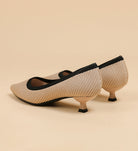 Mescini beige knit pointed toe kitten heel pumps, seen from behind at an angle, US women's sizes