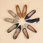 Mescini knit pointed toe kitten heel pumps in all five colors, arranged in a fan, US women's sizes