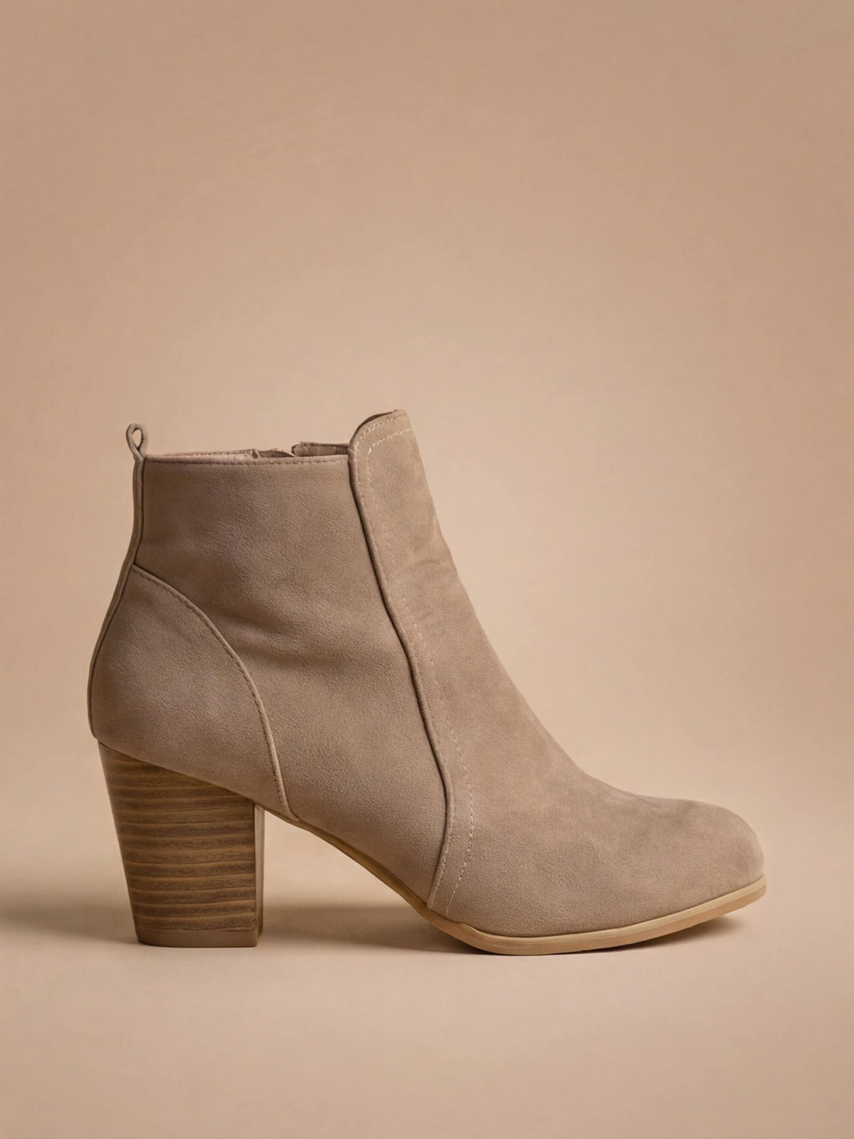 Mescini taupe round toe ankle boot side profile showing the stacked block heel and zip