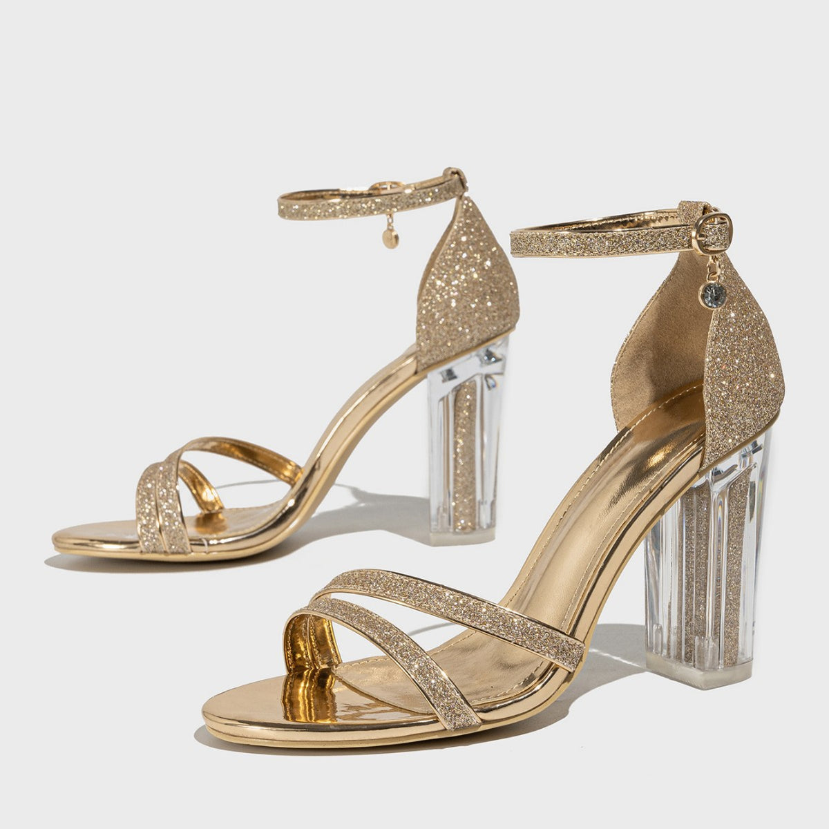 Mescini – Champagne glitter clear block heel sandals, studio pair on white, US women's sizes
