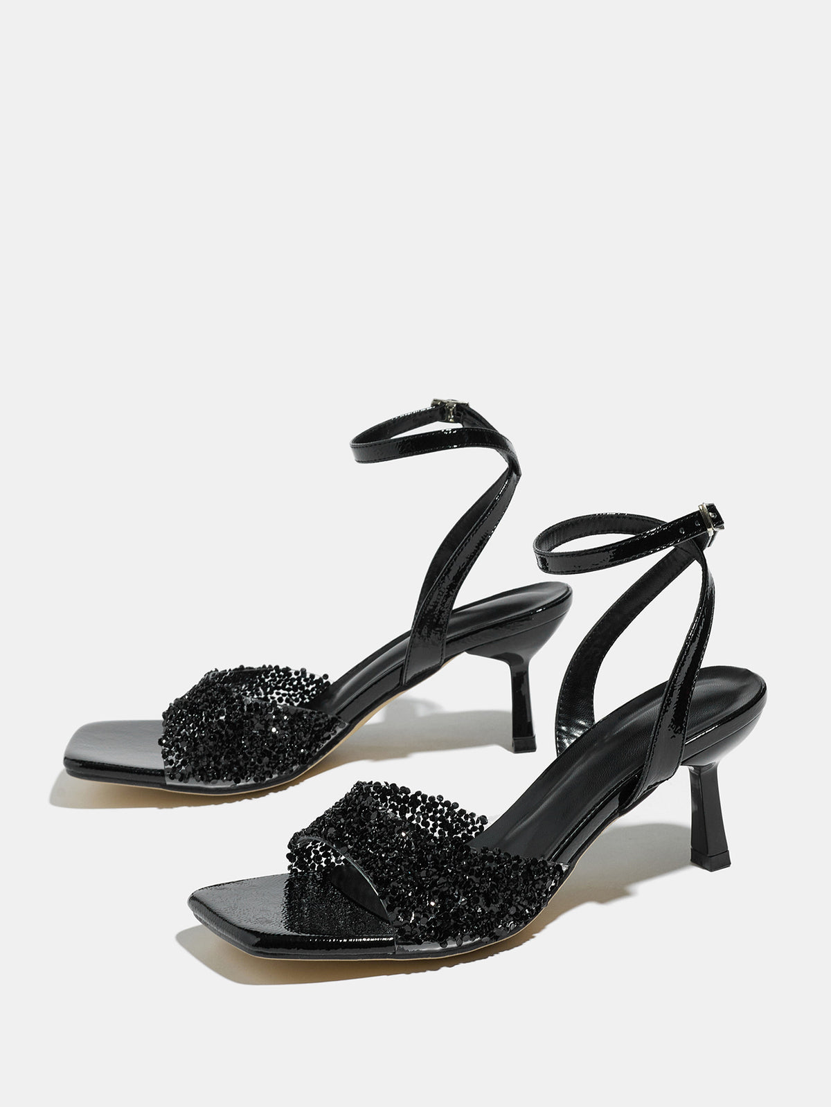 Mescini black rhinestone square toe heeled sandals, pair angled on a pale background, US women's sizes