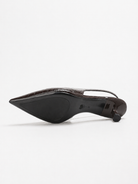 Mescini brown pointed toe slingback kitten heels, underside of a single shoe, US women's sizes