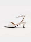 Mescini white ankle strap kitten heel sandals, single shoe profile on a pale ground, US women's sizes
