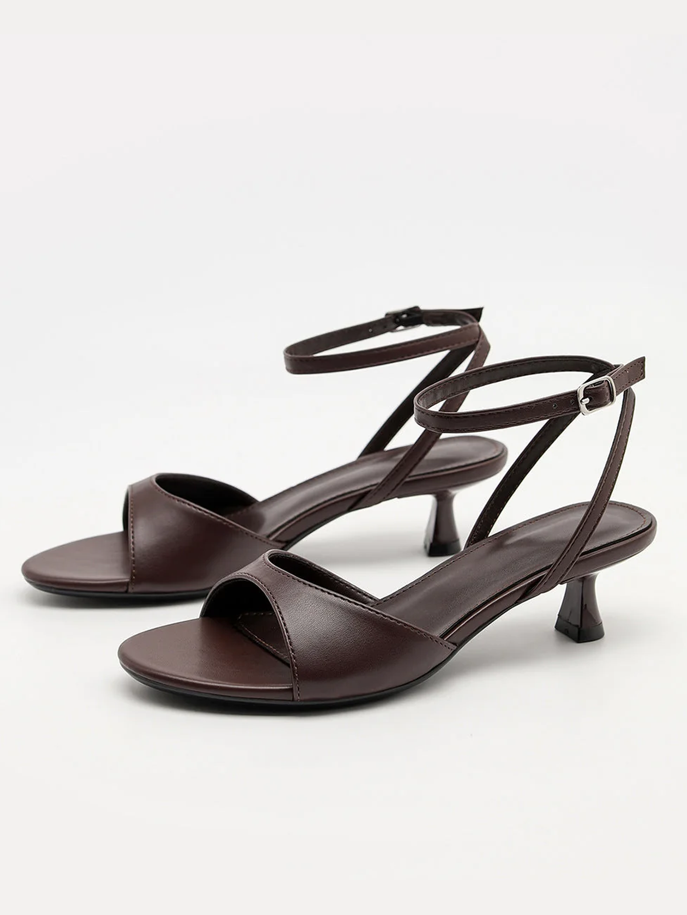 Mescini brown ankle strap kitten heel sandals, pair angled with straps buckled, US women's sizes