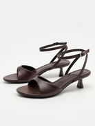 Mescini brown ankle strap kitten heel sandals, pair angled with straps buckled, US women's sizes