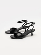 Mescini black ankle strap kitten heel sandals, pair seen at a low angle, US women's sizes
