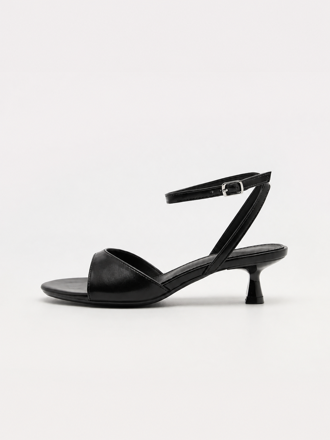 Mescini black ankle strap kitten heel sandals, one shoe from the side, US women's sizes