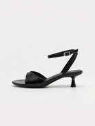 Mescini black ankle strap kitten heel sandals, one shoe from the side, US women's sizes