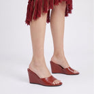 Mescini – red wedge mules worn standing, full wedge profile view, US women's sizes