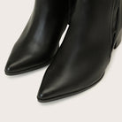 Mescini black chelsea boots, close view of the two long pointed toes side by side