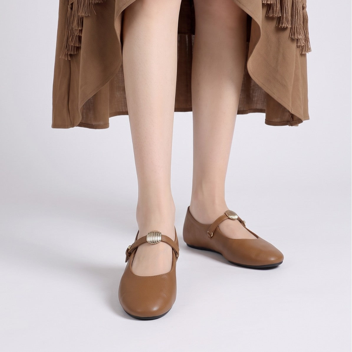 Mescini - camel mary jane flats worn under a skirt, buckle side, US women's sizes