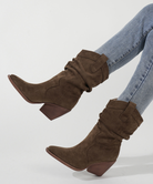 Mescini brown slouch suede western cowboy boots, worn with light blue jeans, walking, US women's sizes