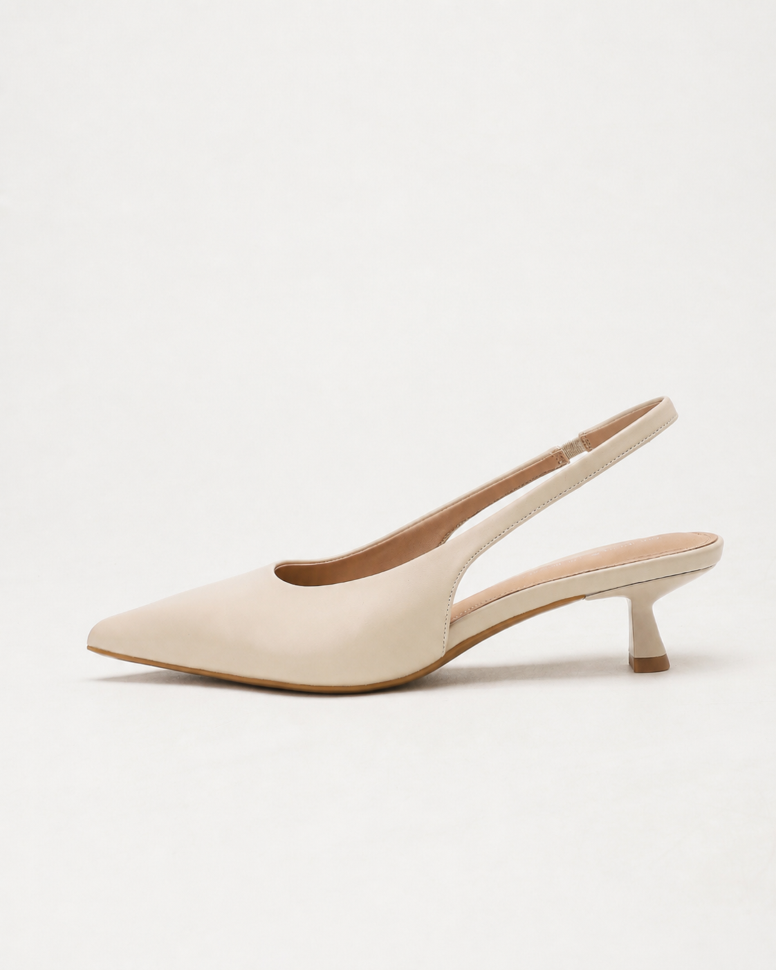 Mescini apricot pointed toe slingback kitten heels, single shoe seen from the side, US women's sizes
