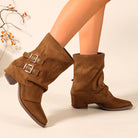 Mescini - camel slouch boots with twin buckle straps on the model, US women's sizes