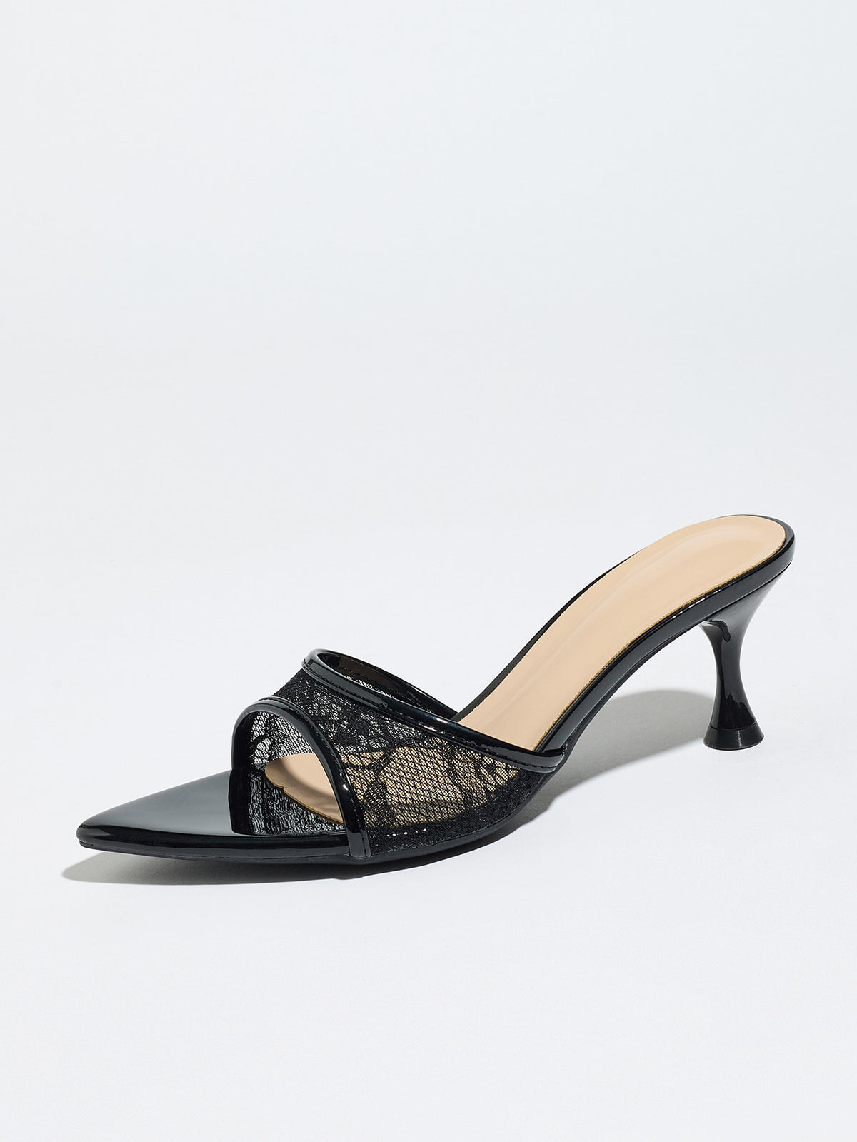 Mescini black sheer lace pointed toe mule heels, single shoe seen from the side, US women's sizes