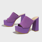 Mescini purple knit band platform mule heels, angled pair seen on grey, US women's sizes