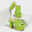 Mescini green knit band platform mule heels, pair staged on white blocks in the studio, US women's sizes