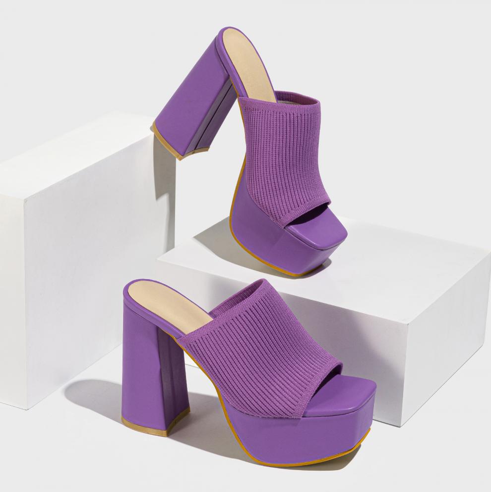 Mescini purple knit band platform mule heels, pair staged on a white block and riser, US women's sizes
