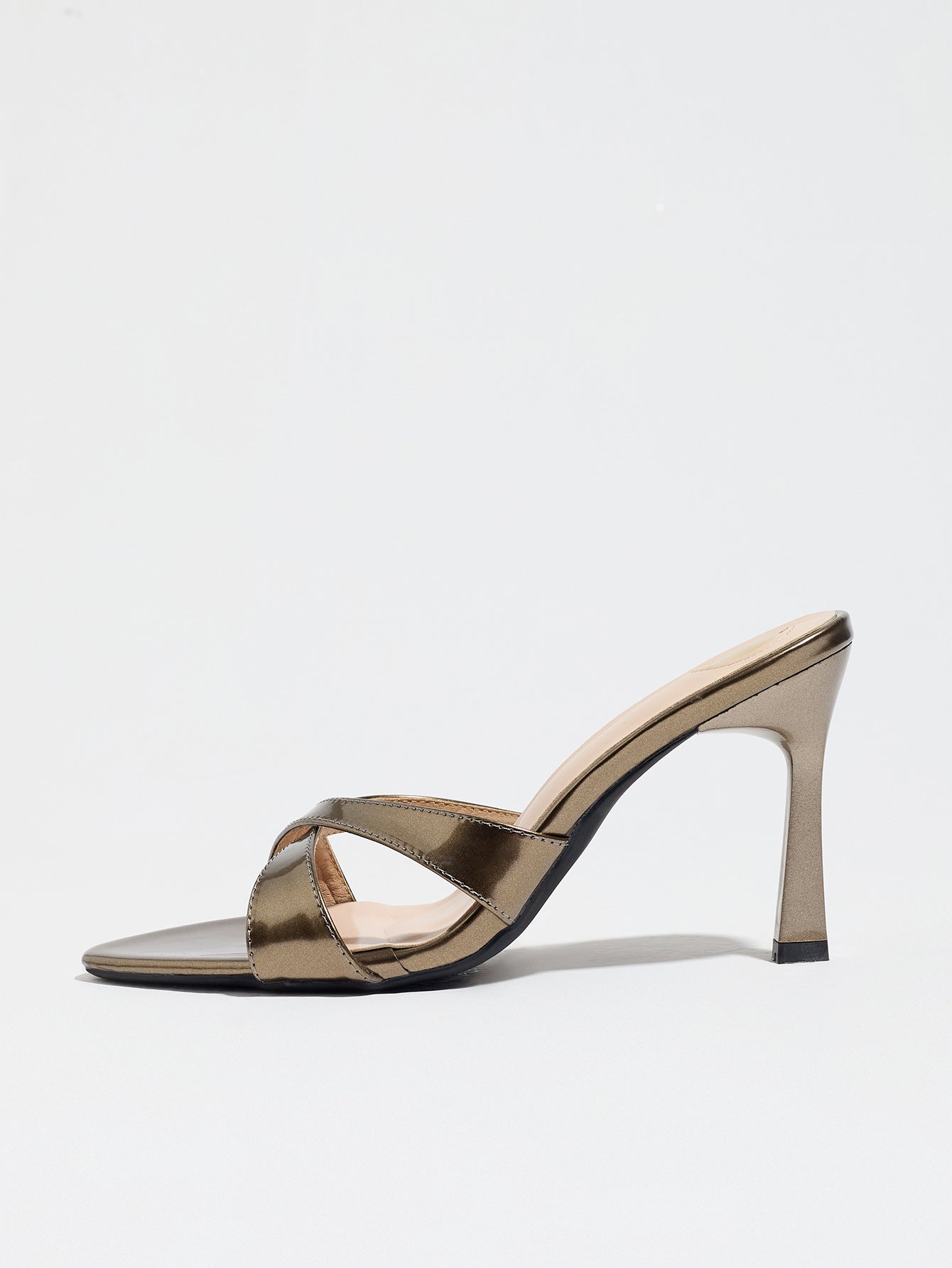 Mescini bronze cross strap stiletto mule sandals, one shoe in full side view, US women's sizes