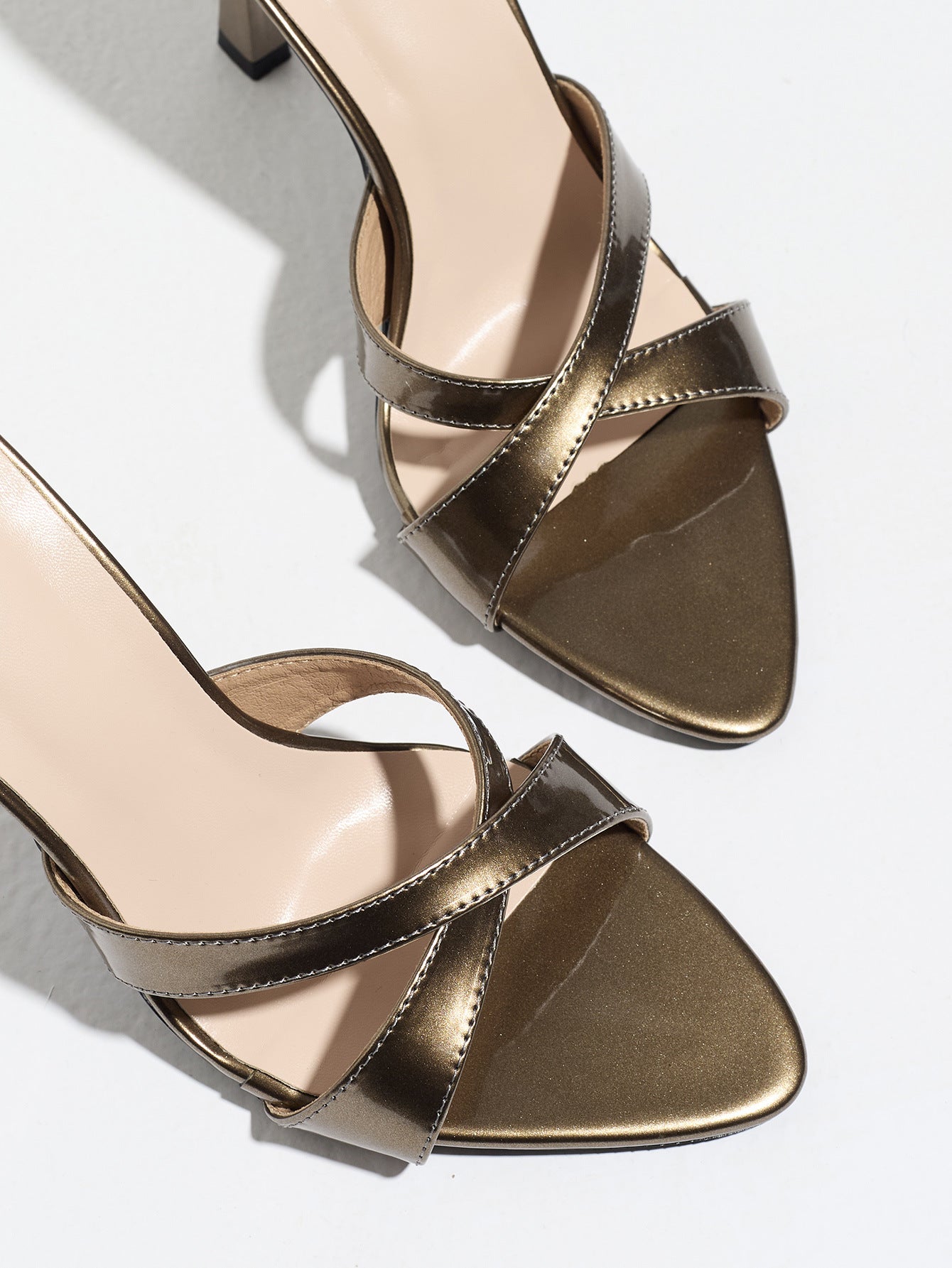 Mescini bronze cross strap stiletto mule sandals, close up of the crossed bands, US women's sizes