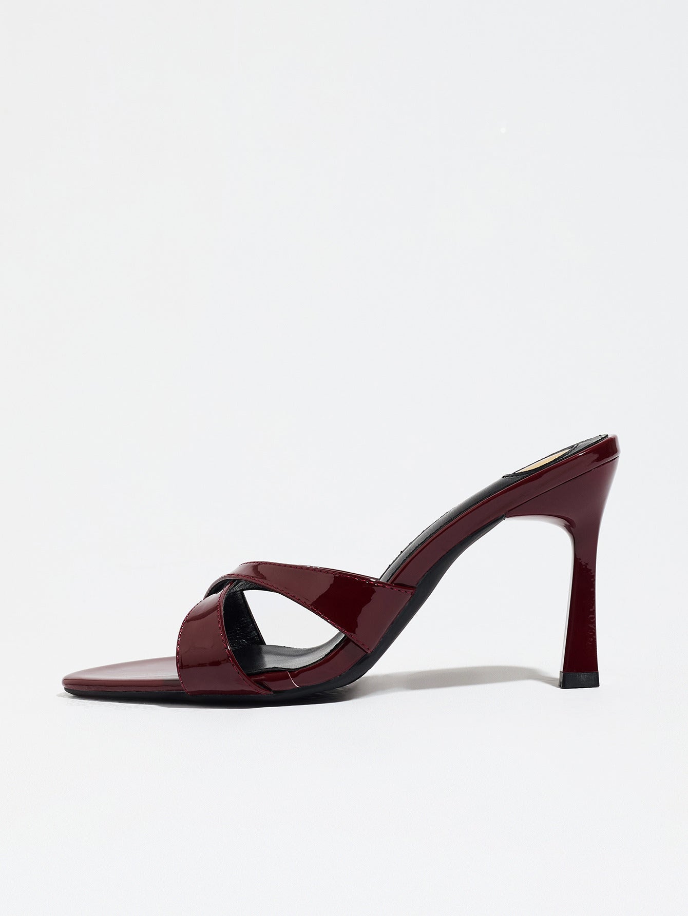 Mescini burgundy cross strap stiletto mule sandals, single shoe side profile, US women's sizes
