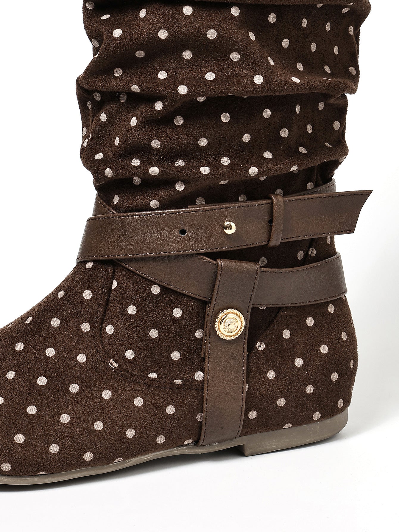 Mescini brown ruched buckle fold over flat boots, close up of the strap and polka dots, US women's sizes