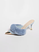 Mescini blue faux fur pointed toe stiletto mules, single shoe on a plain white backdrop, US women's sizes