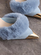 Mescini blue faux fur pointed toe stiletto mules, close up of the trim and gold tip, US women's sizes