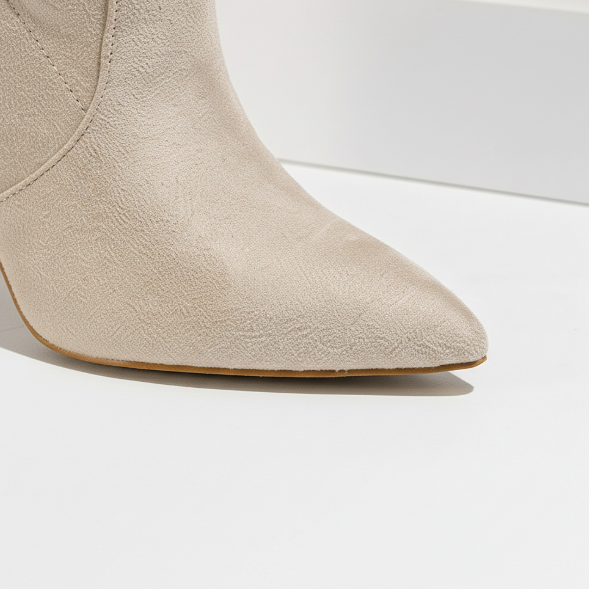 Mescini - beige pointed toe boots, close view of the toe and thin sole, US women's sizes