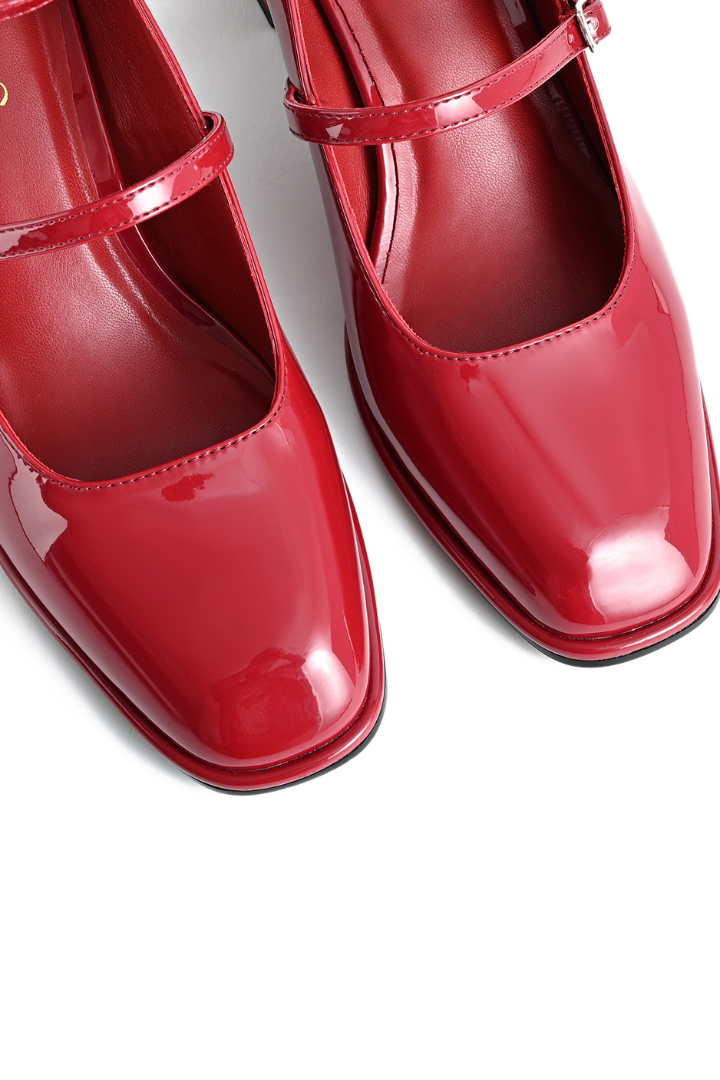 Mescini red square toe block heel mary janes, close up of the two glossy patent fronts, US women's sizes