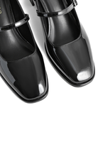 Mescini black square toe block heel mary janes, close up of the patent finish on both shoes, US women's sizes