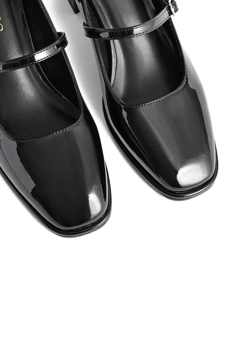 Mescini black square toe block heel mary janes, close up of the patent finish on both shoes, US women's sizes
