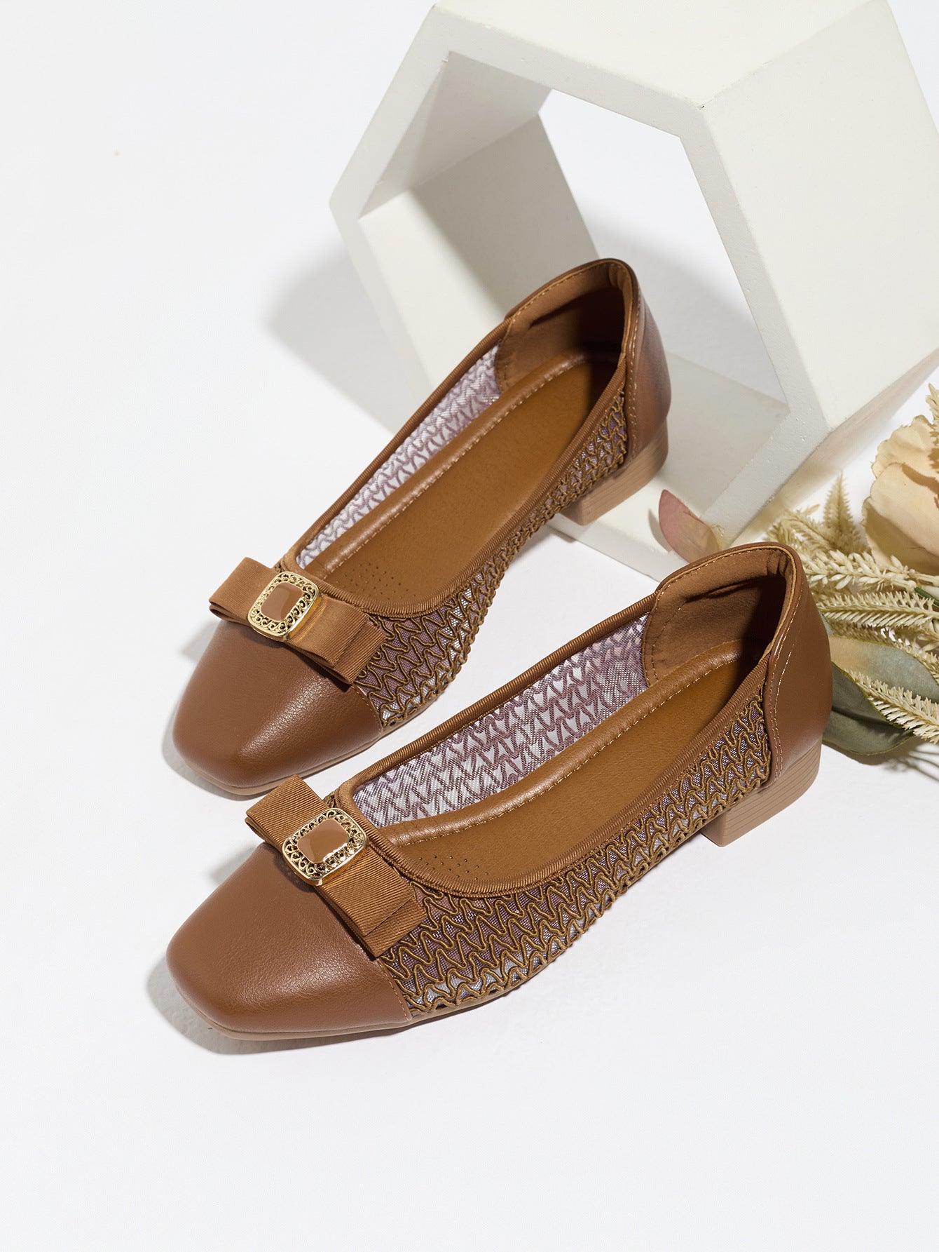 Mescini brown grosgrain bow square toe ballet flats, pair propped on a white block, US women's sizes